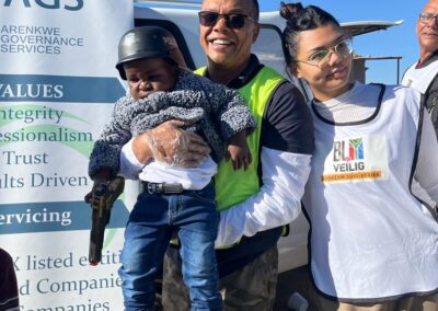 Director-and-his-daughter-holding-a-little-boy
